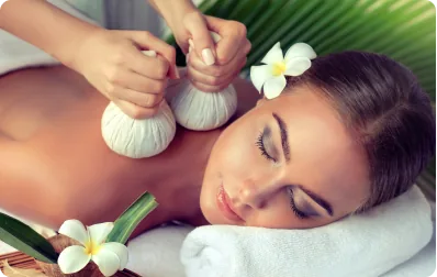 Traditional Thai herbal compress treatment